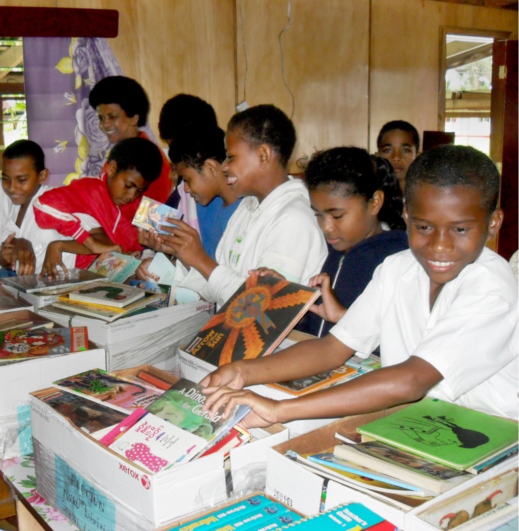 Students in Fiji receive boxes of books from The Book Exchange. (Photo courtesy of Marilyn Nemzer)