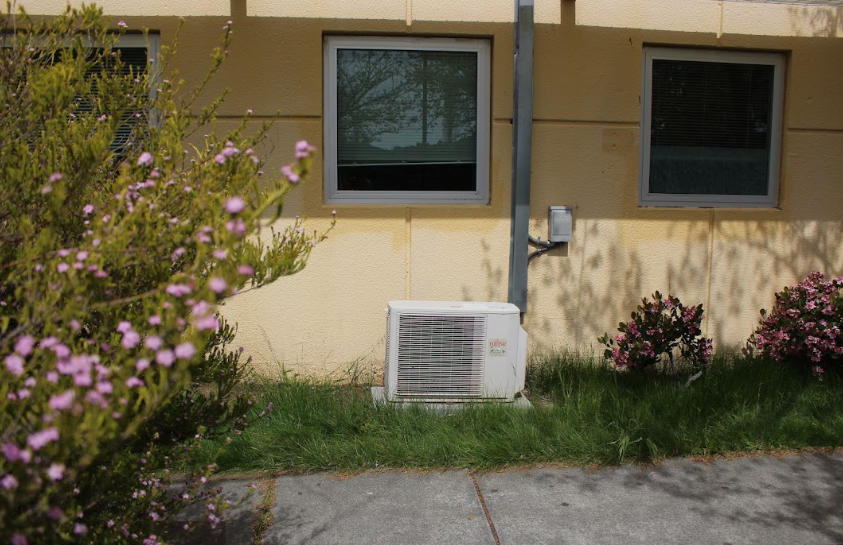 Boldly standing out, an outdated air system contrasts the nature of Redwoods campus.