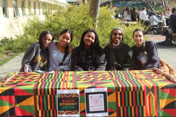 Aiming to educate students, Black Student Union members gain more support during their Black History Month celebration at lunch. (Photo courtesy of Emily Block)

