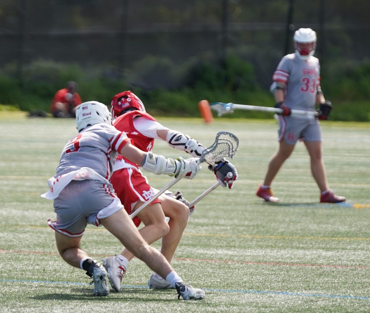 A close game between Redwood Boys Lacrosse and Mater Dei. Photo Courtesy of Blake Atkins and Mark Holmstrom