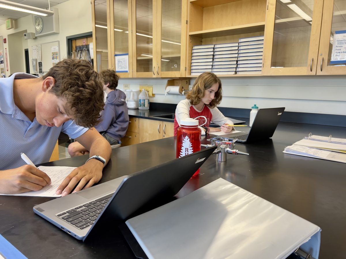 Students in chemistry class use Chromebooks to complete classwork. 