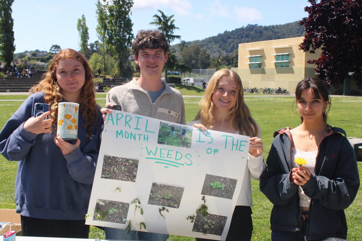 Sasha Lilien, Jace Harms, Courtney Kunz and Jane Broderick helping at the Sustainability Faire (Photo courtesy of Emily Hitchcock).
