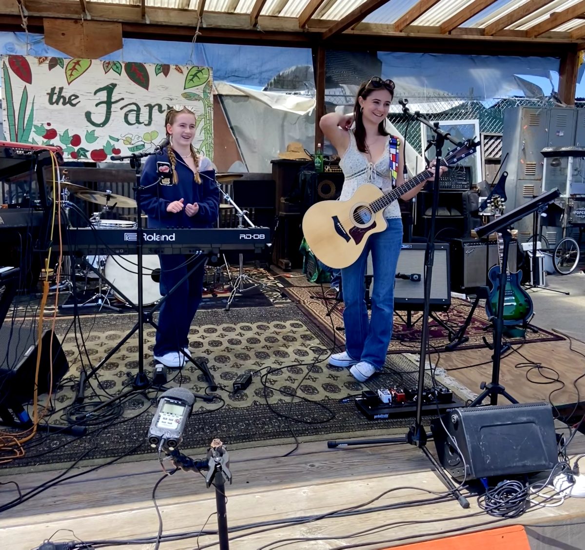 Preparing to play the next song with The Lunar Mooners, Fago beams at the audience.