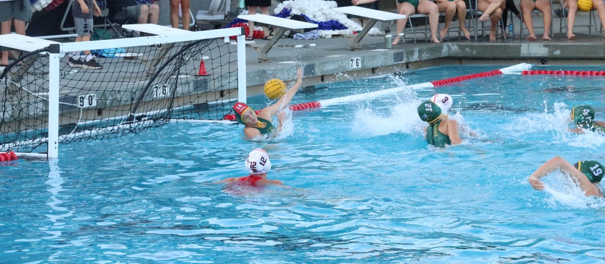 Junior Kate Morgan sneaks the ball past the San Marin goalie, earning another point for the Giants.