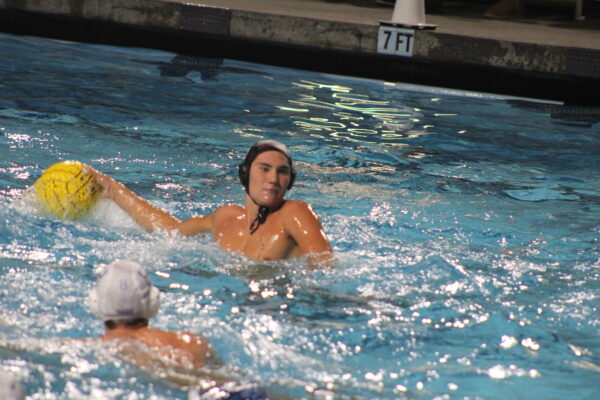 Scanning the pool, Sophomore Jakob Engberg is trying to pick out the right pass.