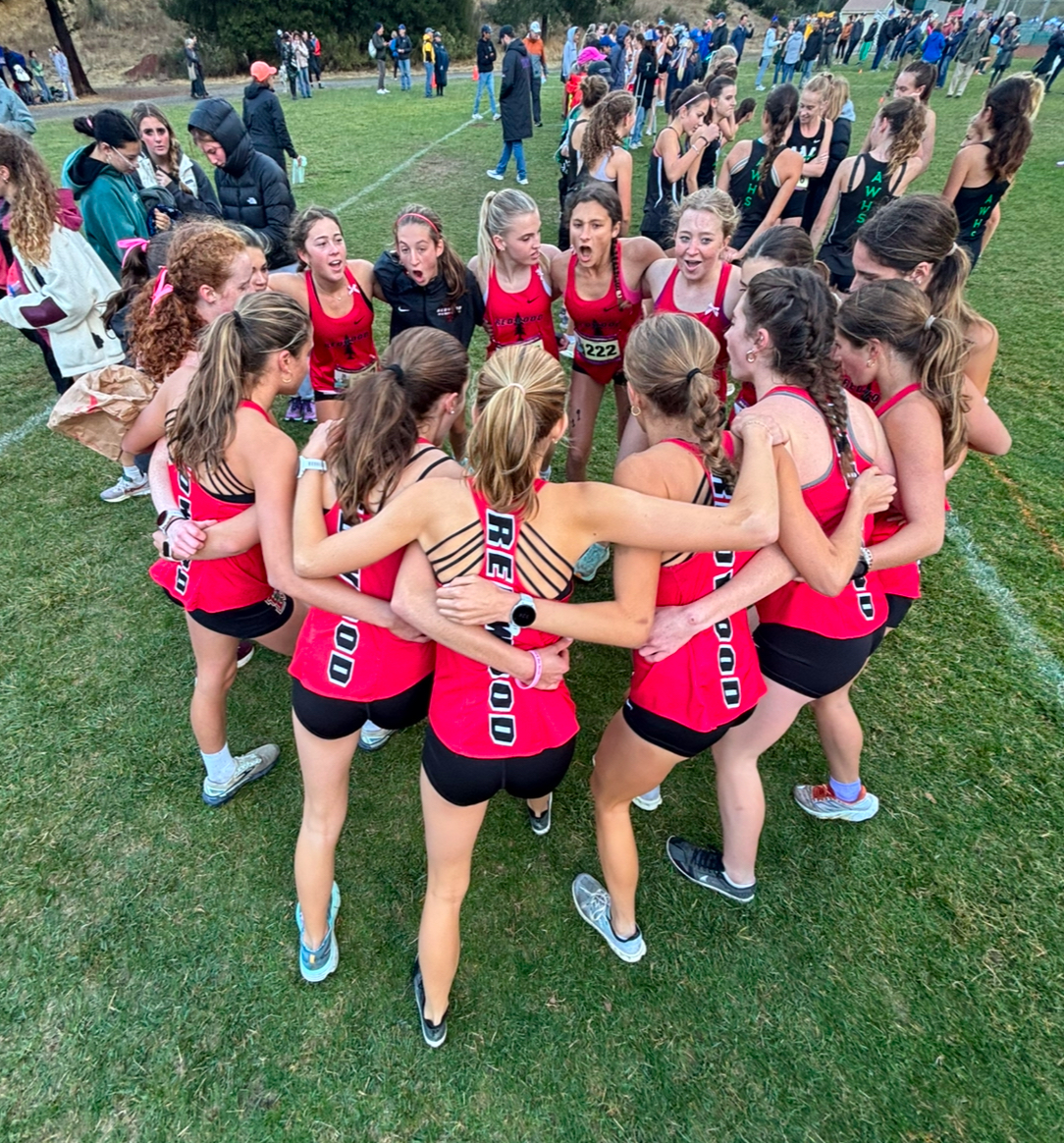 Five minutes before the gunshot went off, signaling the runners to start, the girls did their pregame tradition of chanting in a circle with smiles on their faces. Not only did this intimidate the other teams, but it also boosted Redwood’s energy.