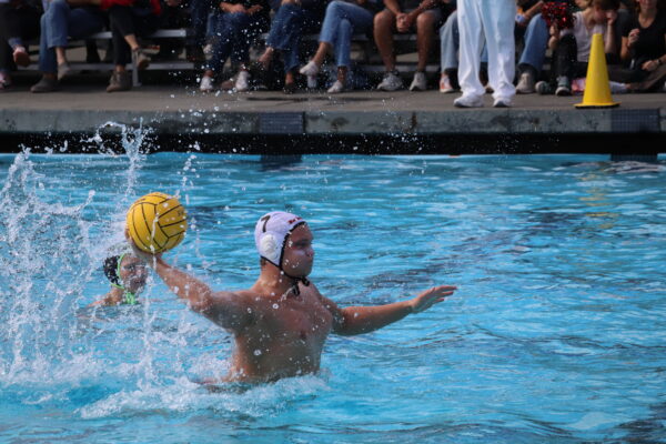 Senior Ossie Joplin (8) scores on a five-meter shot, bringing the Giants' deficit to two goals in the fourth quarter.