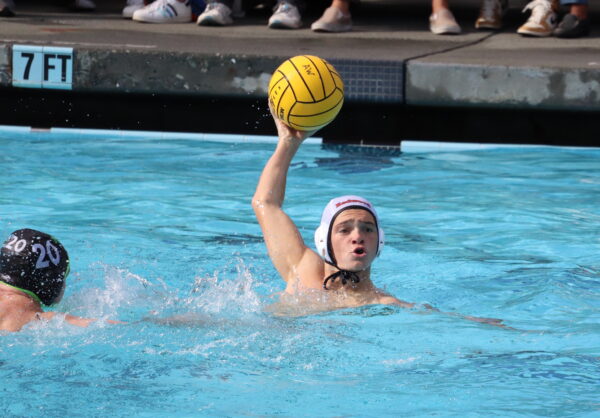 In a six-on-five penalty play, junior Oliver Rogers takes an open shot on goal. 