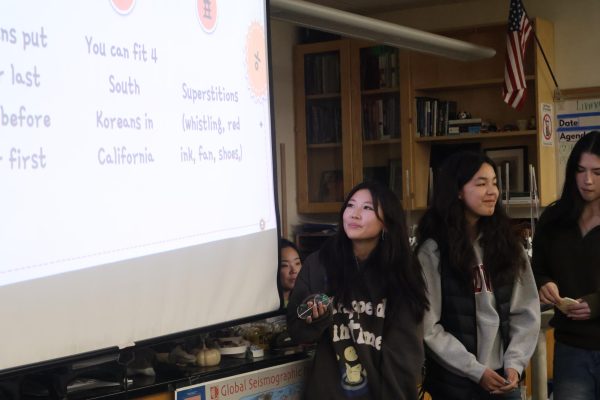 Sophie Kim teaches club members fun facts about Korea and how to speak Korean.