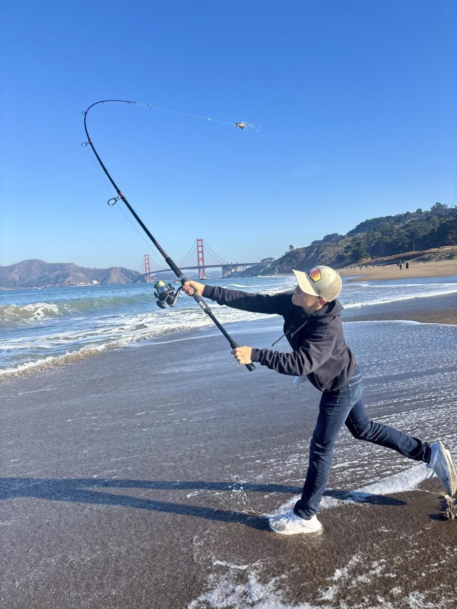 Sophomore Cole Guerrero passionately casts out his crab snare at Baker Beach.
