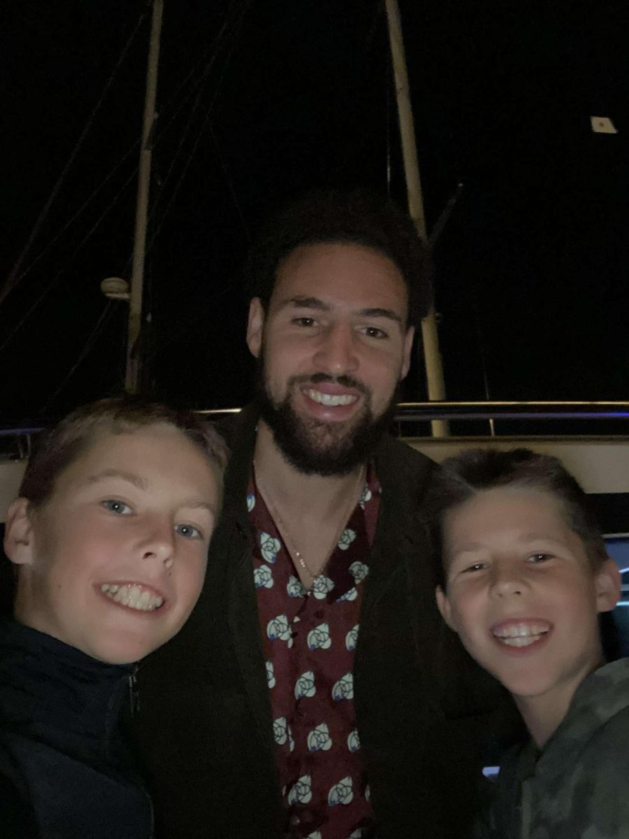 NBA All-Star Klay Thompson poses for a selfie with sophomore Cole Guerrero and his brother Brody.
