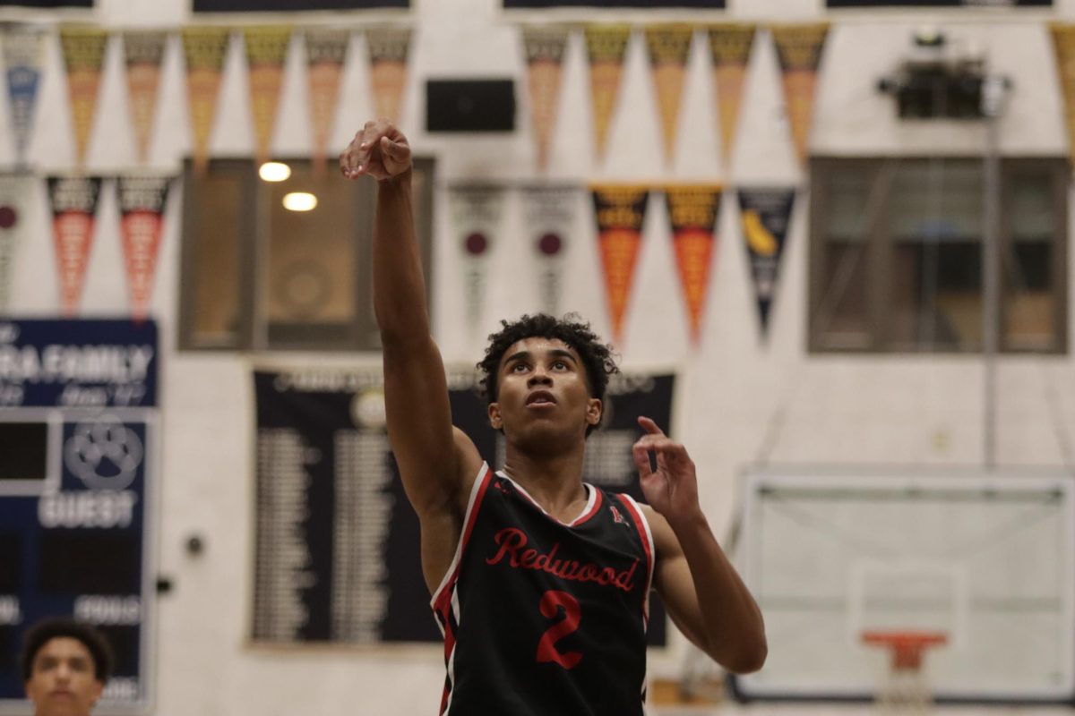 TT Carr holds his follow-through after making two game-tying free throws with just seconds left.