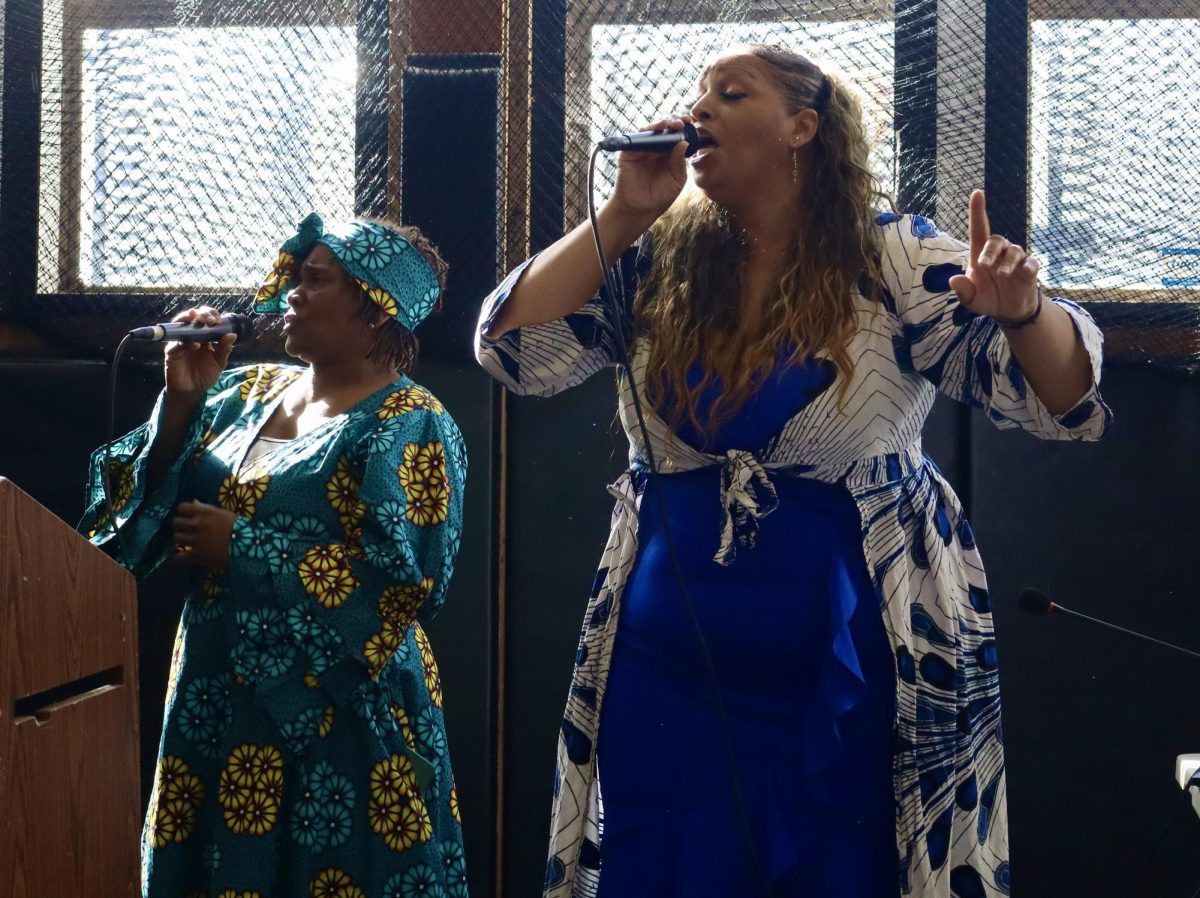 Gospel band Elder Ron Rosson & Friends sing ardently to classic gospel tunes, prompting the audience to join in.