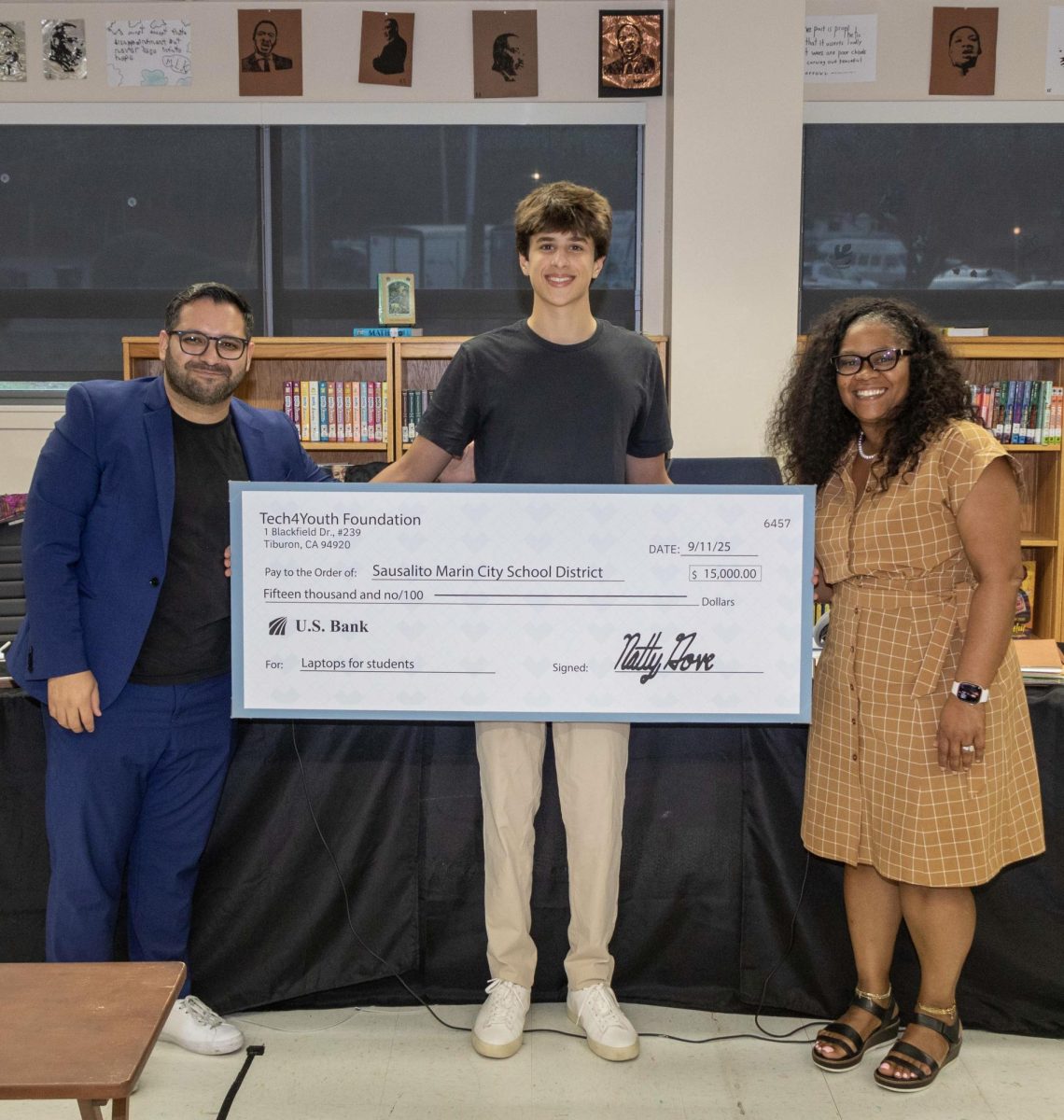 With the help of over 65 donors, Natty Gove delivered the final check worth $15,000 to the SMCSD. (Photo courtesy of Natty Gove.)