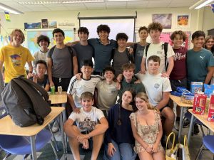 Members of the Jewish Student Union pose together in Mrs. Greenberg's classroom, where they meet Fridays during lunch. (Photo courtesy of Maayan Bujanover)