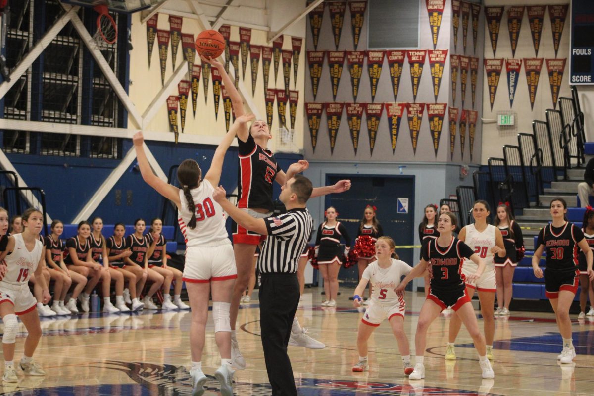 Winning the first jump ball of the game, junior Hindi Copeland earned the first possession.
