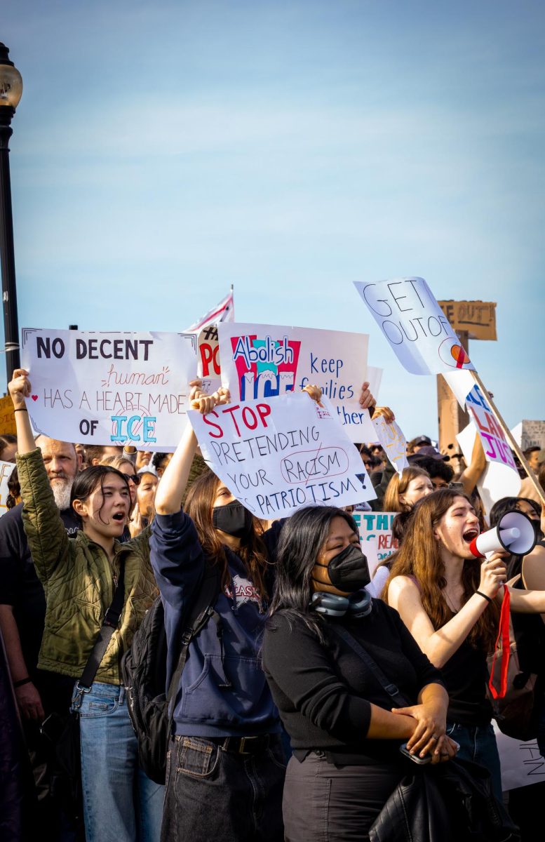 Creative signs fill the air as protesters' voices are heard in Dolores Park and around the city.