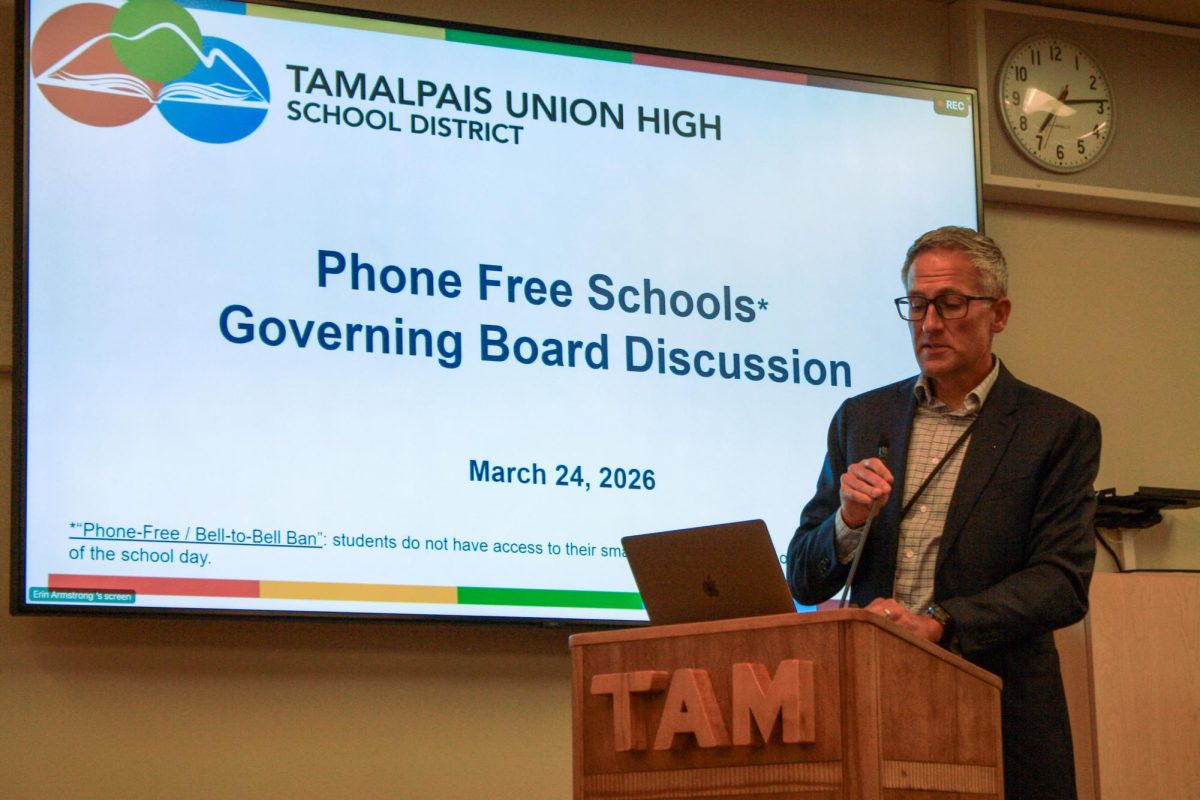 Standing in front of the Tamalpais Union High School District (TUHSD) Board of Trustees, Superintendent Dr. Courtney Goode delivers a presentation on the phone-free future at TUHSD.