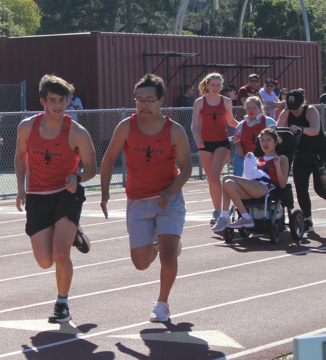The Unified Athletes race the 100-meter sprint in their final event of the day.