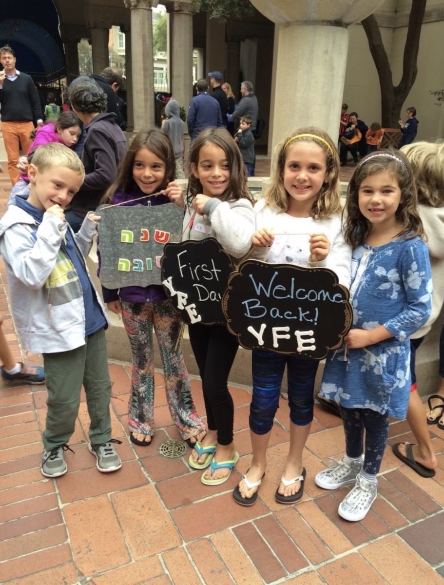 Sophie Levin celebrates the first day of Youth and Family Education (YFE) at Temple Emanu-El with her childhood friends. Photo courtesy of Sophie Levin. 
