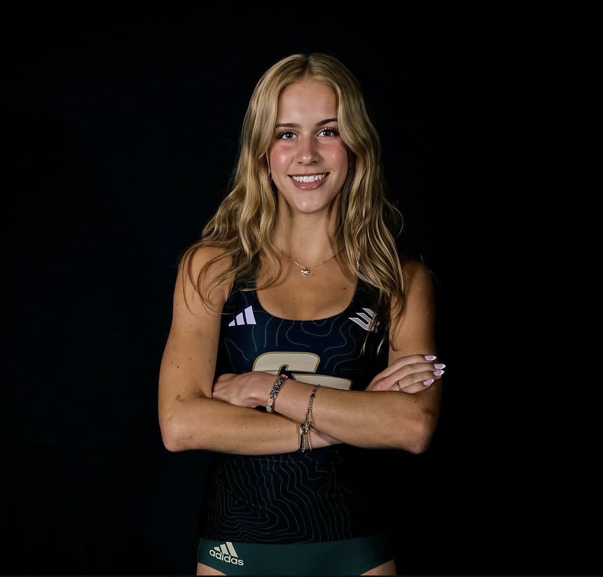 After committing to Cal Poly San Luis Obispo, Sydney Middleton poses in her new uniform. (Photo Courtesy of Sydney Middleton)