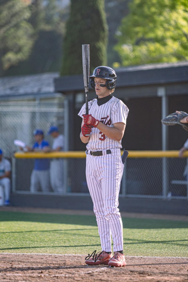 Junior Chase Johnson takes a deep breath ahead of his next at bat. (Photo courtesy of Asch Visuals)