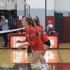 Freshman Maddy Wagner prepares to block the upcoming hit from the opposing team.
