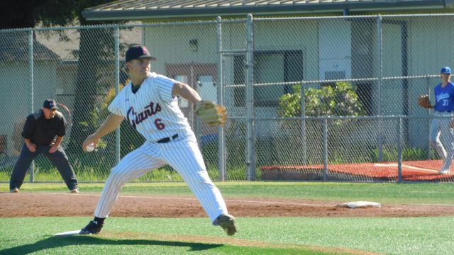 Showcasing his velocity, senior Rex Solle fires in a fastball.