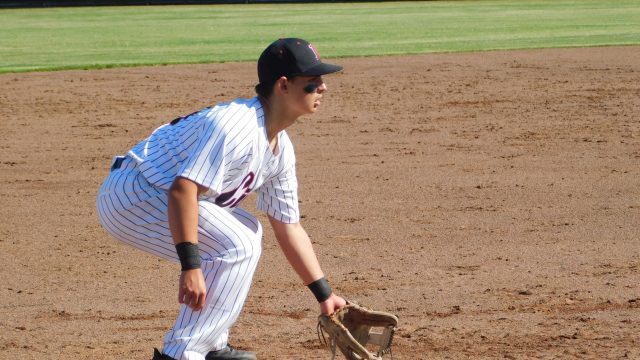 Matthew Knauer gets in position at third before making a dazzling play to throw out the runner.