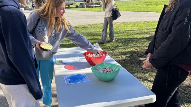 Ari Ziegler, one of the Wellness staff members, chats with freshman Berkeley Smith on the first day of the Wellness Stress-Less event.